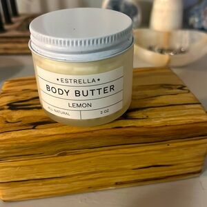 NWT never opened Estrella body butter in Lemon 2oz, all natural.